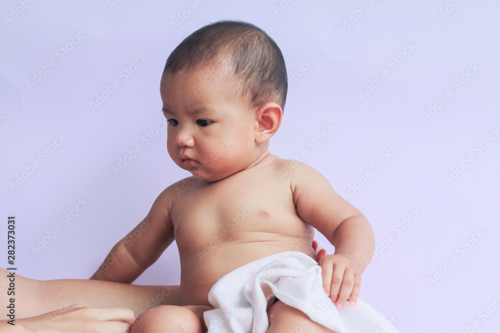 portrait of asian baby girl sitting on white background portrait of asian baby girl sitting on white background
