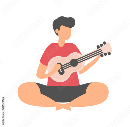 Male sitting on floor and playing guitar isolated cartoon character. Vector friend play on music instrument, young musician flat style, handsome performer