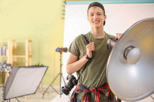 Teenage photographer in pro...