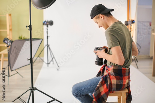 Teenage photographer in pro...