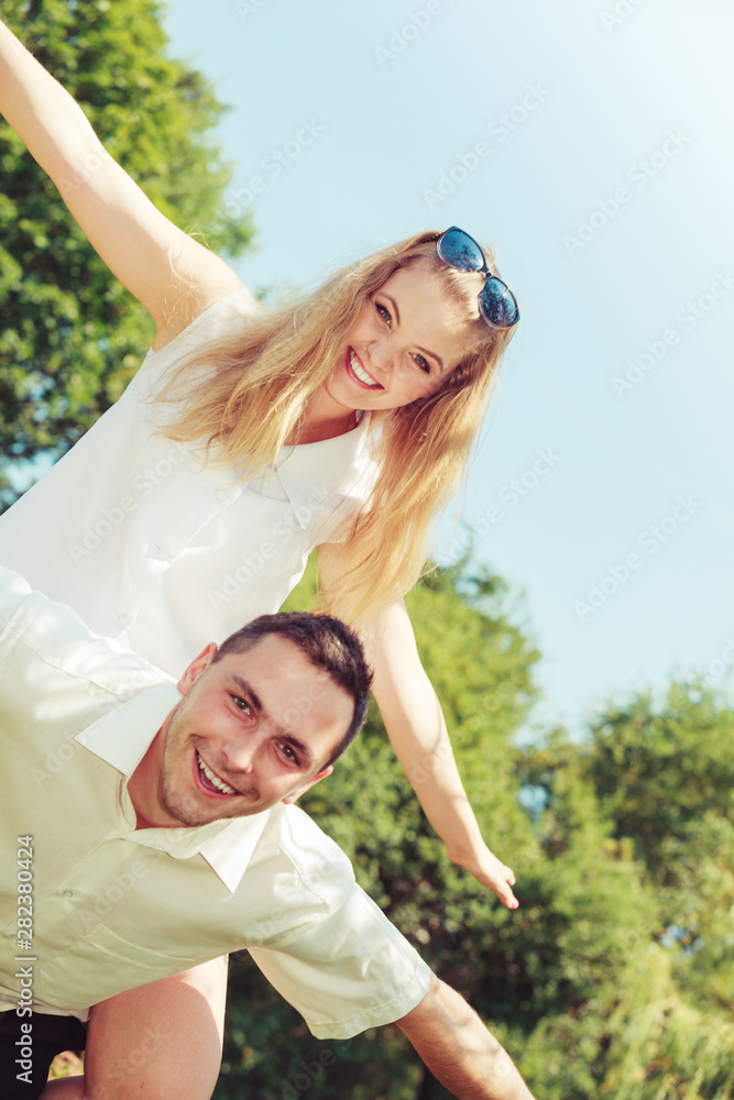 Happy couple having romantic date in park Happy couple having romantic date in park