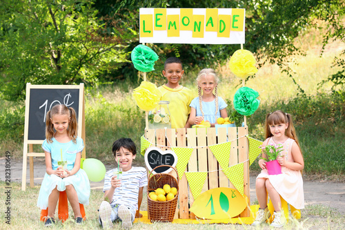 Cute little children sellin...