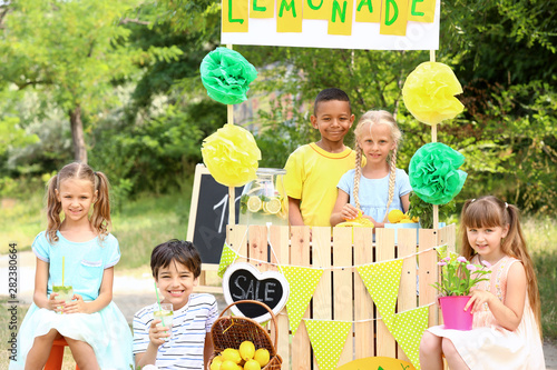 Cute little children sellin...