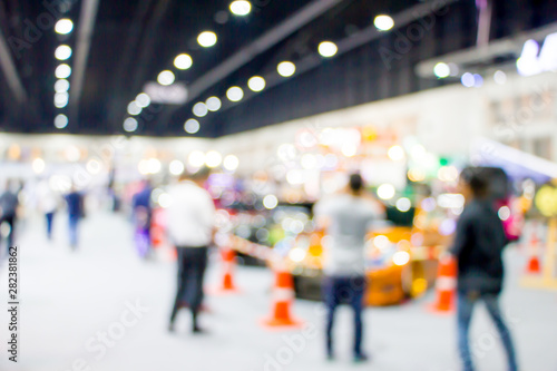 blurred people in motor show