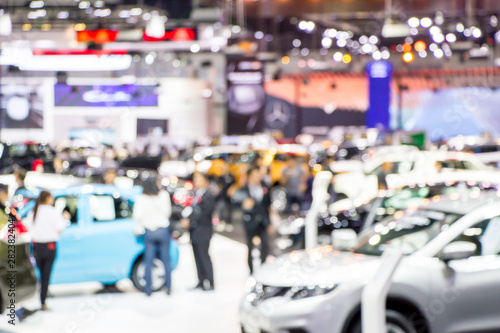 blurred people in motor show