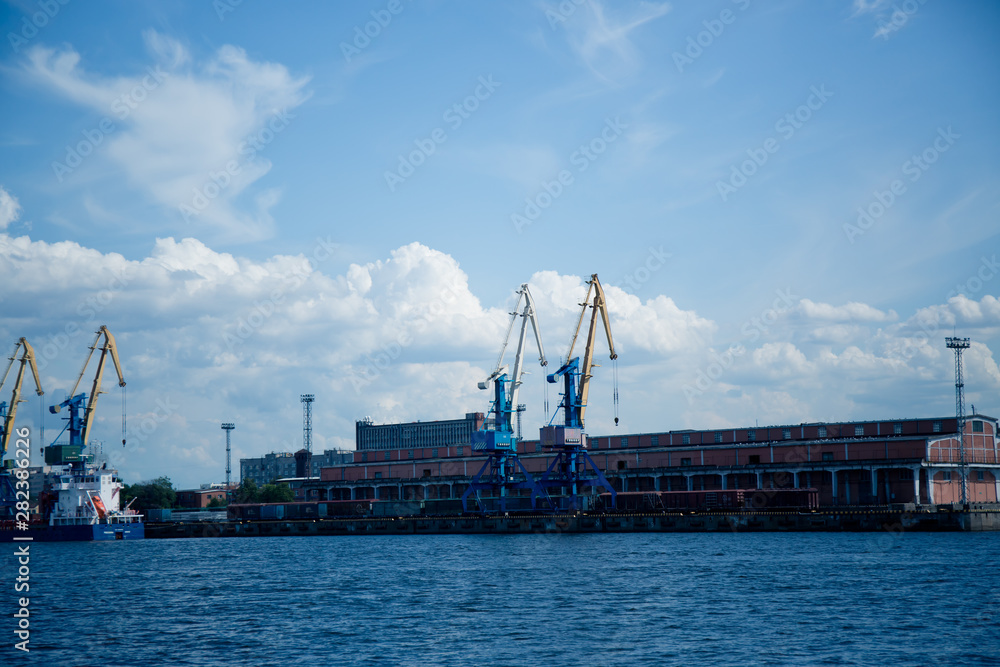 cargo cranes for unloading ships in the port