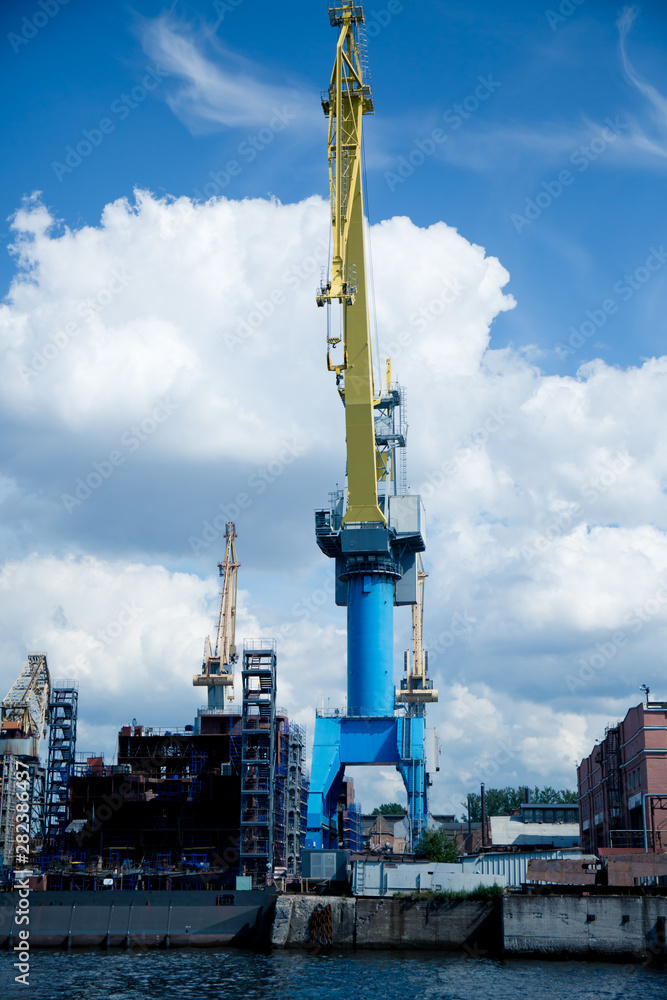 cargo cranes for unloading ships in the port