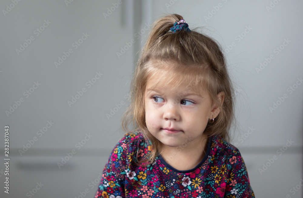 Portrait of thinking and pensive child looking aside Portrait of thinking and pensive child looking aside