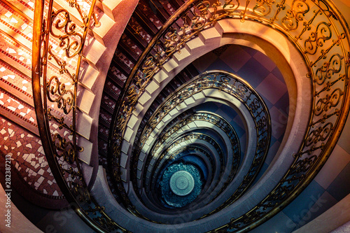 Wallpaper Mural Spiral staircase from top to down decor design in Europe style.