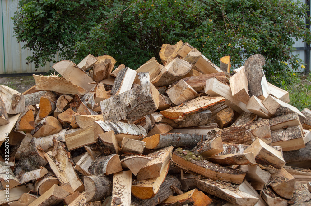 pile of chopped birch, alder and aspen firewood pile of chopped birch, alder and aspen firewood