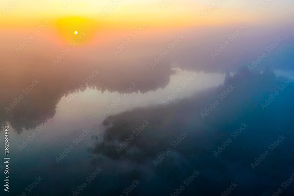 Fog concept. Temperature contrast in rural area in morning. Aerial landscape