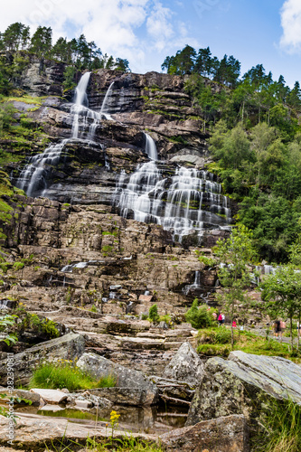 Waterfall Tvindefossen,o r Twinnefossen, Trollafossen on the road to flam near Voss in Norway. The waterfall is 152 m high photo