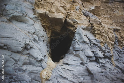 Cueva en montaña rocosa  photo