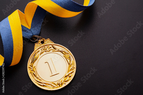 Champion or first placed winner gold medallion photo