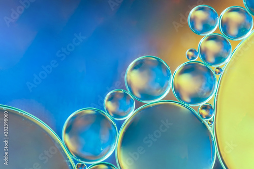 Blue and yellow abstract background with bubbles