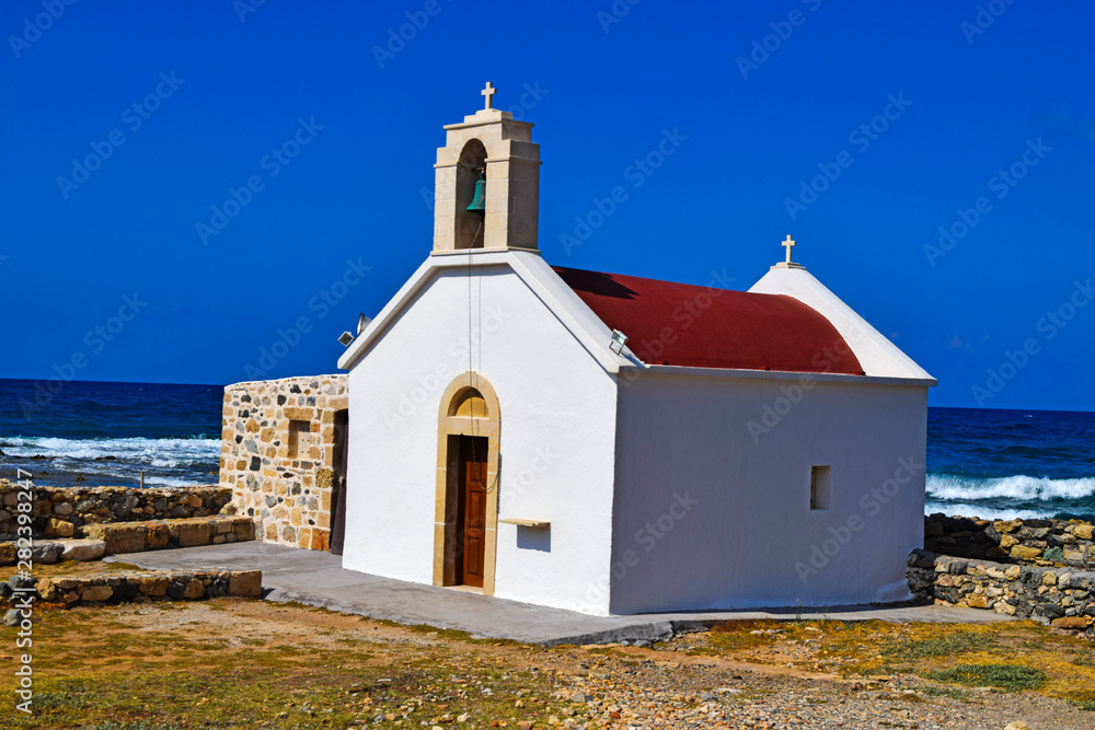 Small church by the sea in Chersonissos on the Crete, Greece. Small church by the sea in Chersonissos on the Crete, Greece.