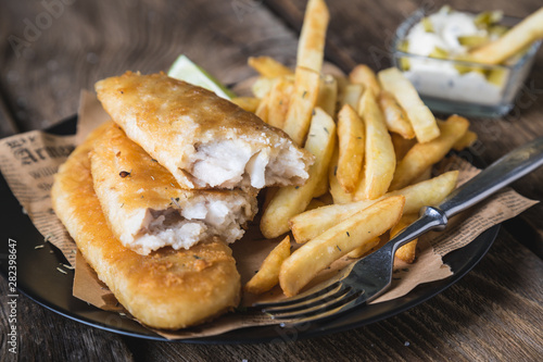 Photography Fish and chips. English dish of fried fish and potatoes