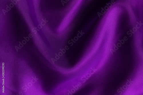 Purple fabric cloth texture for background and design art work, beautiful crumpled pattern of silk or linen. photo