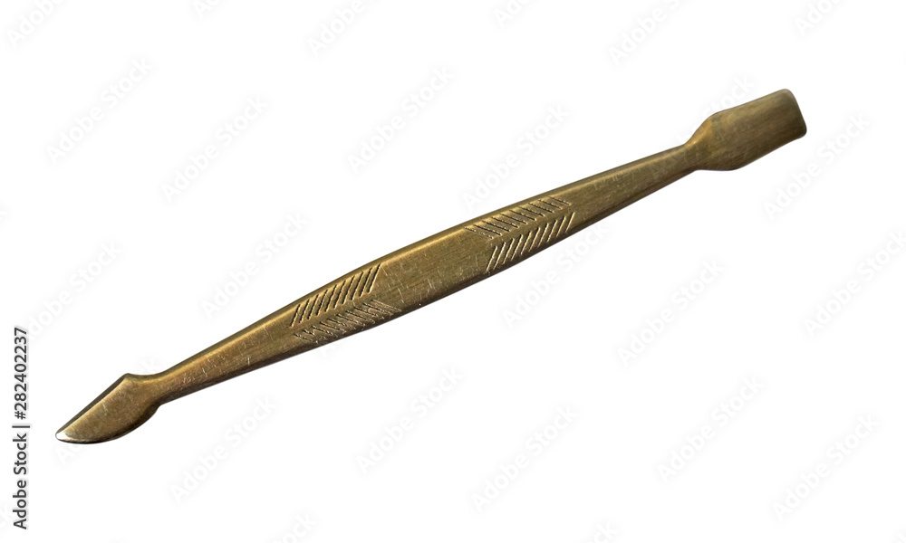 Nail pusher for manicure and personal nail care isolated on white background. Nail pusher for manicure and personal nail care isolated on white background.