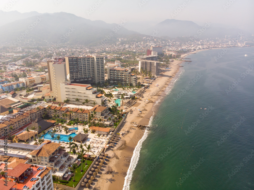 Aerial photos of the pier knows as Playa Los Muertos pier in the beautiful town of Puerto Vallarta in Mexico, the town is on the Pacific coast in the state known as Jalisco