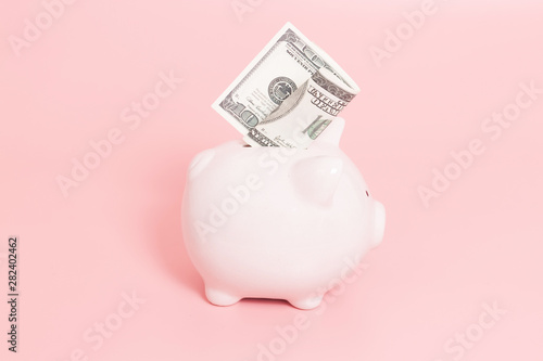 Piggy bank money on blue background