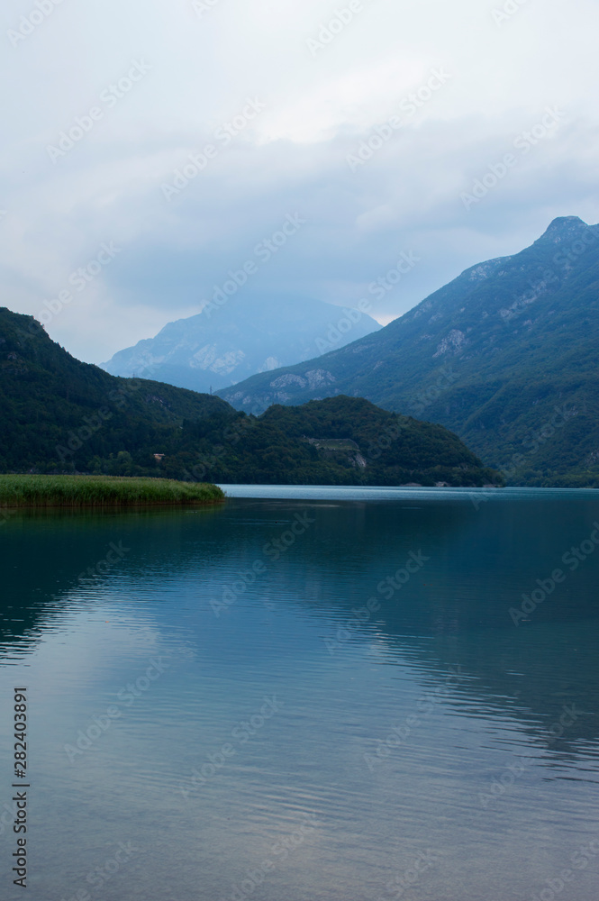 Mountain lake on the background of the Alps
