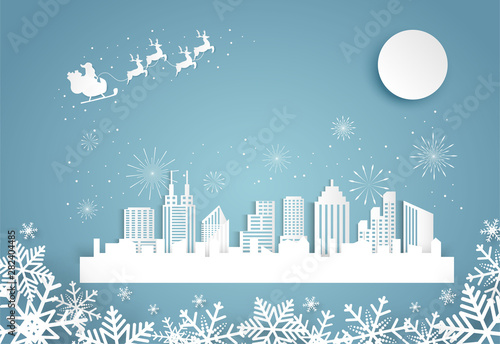Christmas and happy new year blue vector background with cityscape and fireworks celebration concept, paper art design