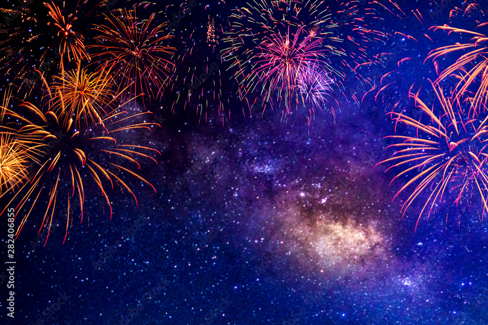 Fototapeta Fireworks with blur milky way background