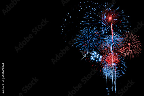 Red and Blue Fireworks on Black background photo