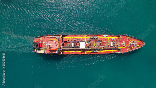 Aerial top view photo of industrial fuel supply vessel cruising in Mediterranean port © aerial-drone