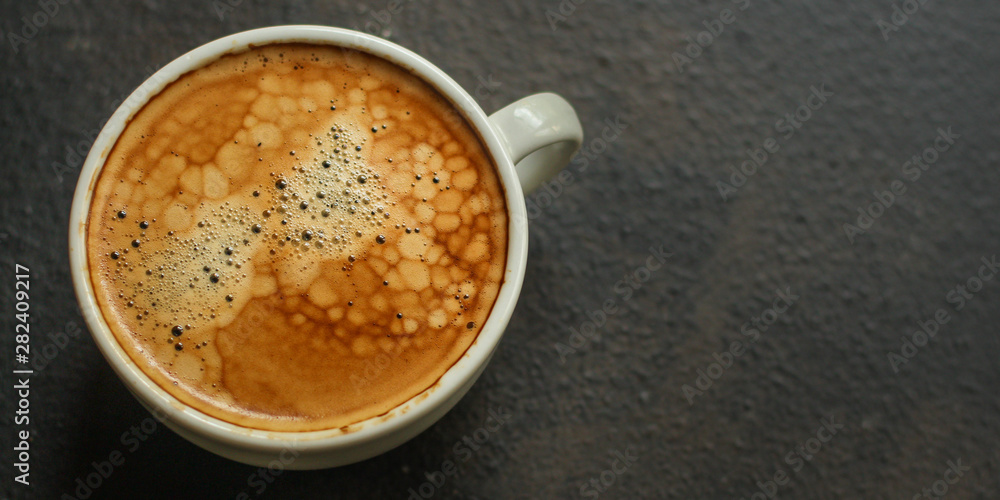 coffee freshly brewed in a white cup serving of beverage (coffee grain). food. top. copy space coffee freshly brewed in a white cup serving of beverage (coffee grain). food. top. copy space