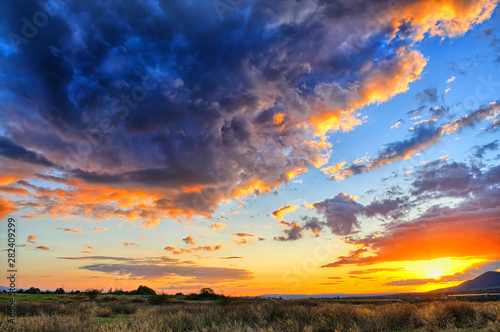 Intense sunset with massive clouds covering the sky