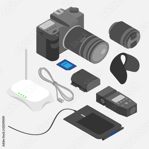 Isometric computer devices. Design and photography tools, Photostudio equipment set. Photo camera, lens, flashlight and battery. Graphic tablet and router