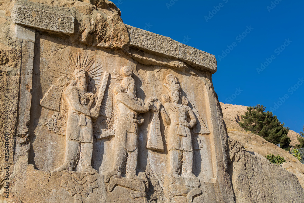 Rock relief of the crowning ceremony of Ardashir II in Taq-e Bostan (a site with a series of large rock reliefs from the era of Sassanid Empire of Persia)  Kermanshah province, Iran