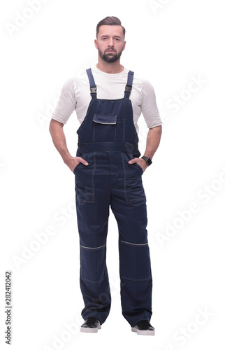 in full growth. smiling man in overalls. © ASDF