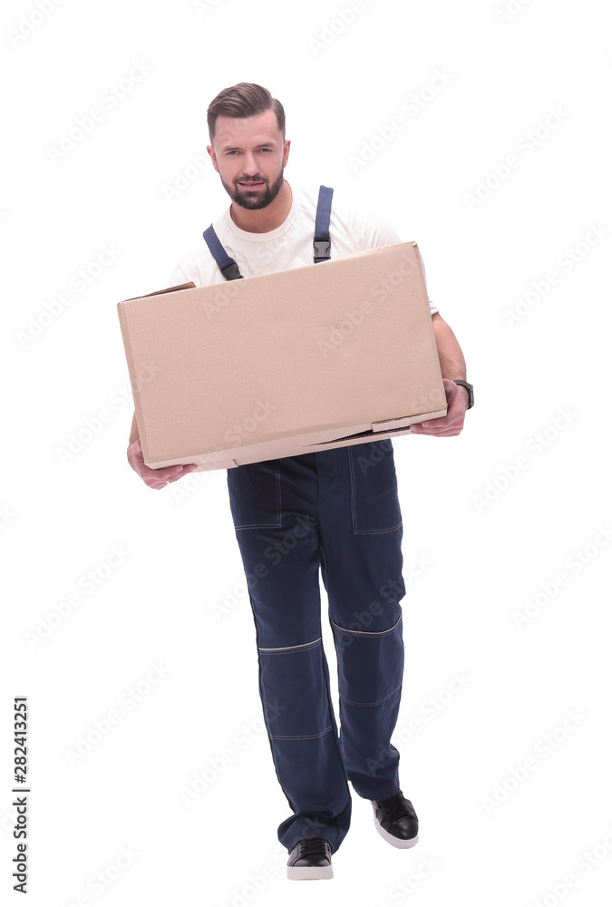 in full growth. a smiling man with cardboard boxes on his shoulders in full growth. a smiling man with cardboard boxes on his shoulders