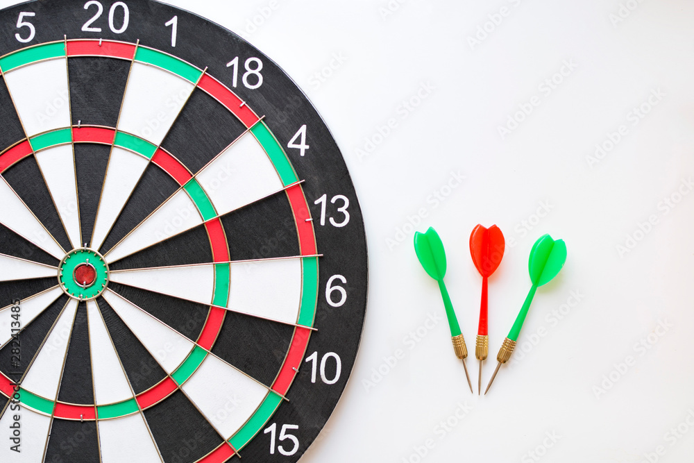dartboard and darts isolated on white background. dartboard and darts isolated on white background.