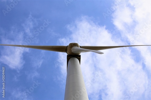 wind turbine against blue sky © Ulf