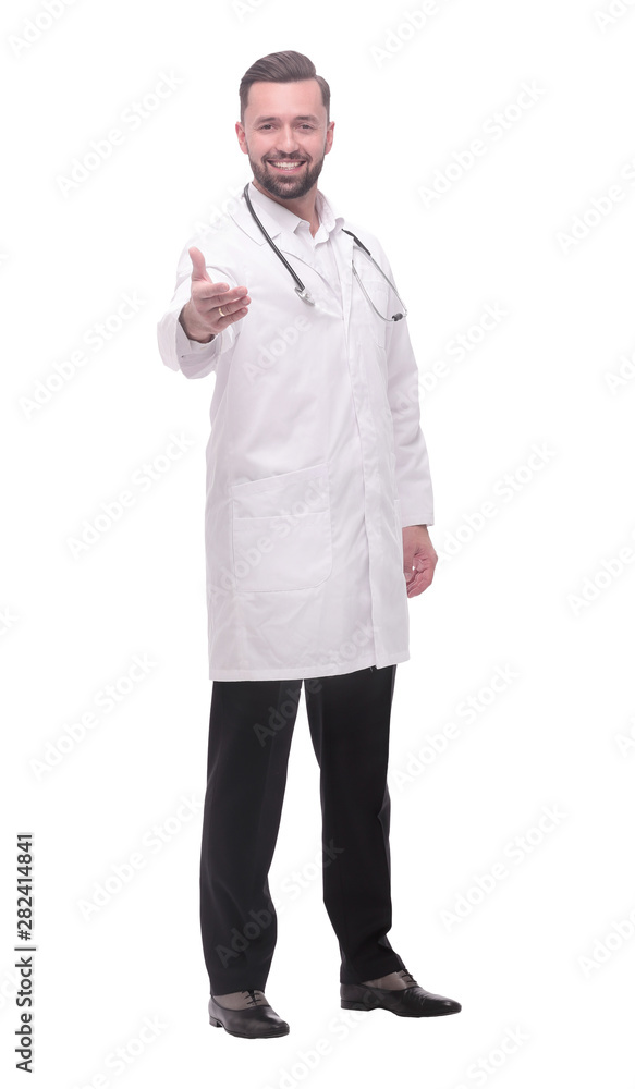 in full growth.a successful medical doctor welcoming you. in full growth.a successful medical doctor welcoming you.