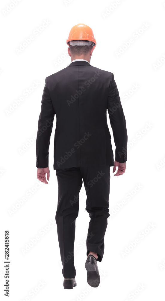 in full growth. businessman in a helmet going forward in full growth. businessman in a helmet going forward