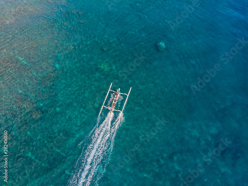 Jemeluk Bay, Amed. Amed is fast becoming a popular tourist destination in Bali, Indonesia. Set in the North-East of Bali, it is a home to excellent snorkeling, scuba diving, freediving and yoga