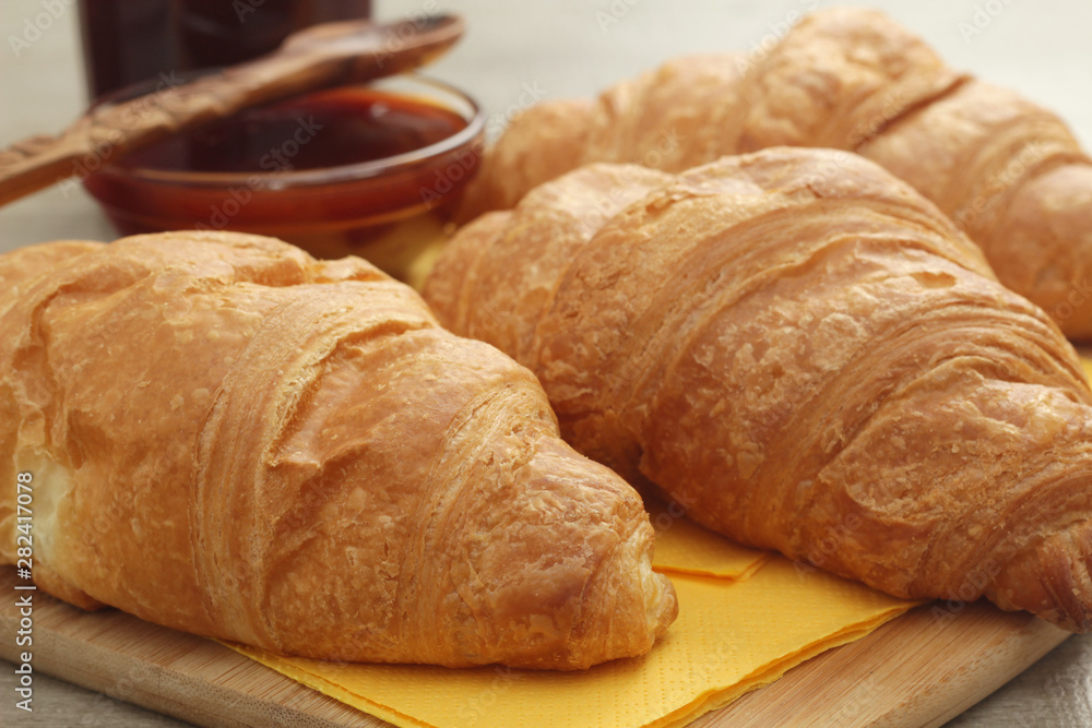 Croissants with marmalade and tea