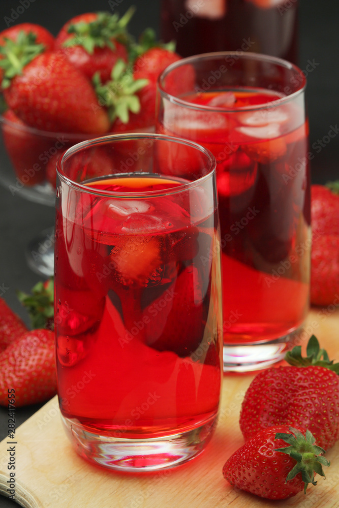 Glasses with strawberry drink with ice Glasses with strawberry drink with ice