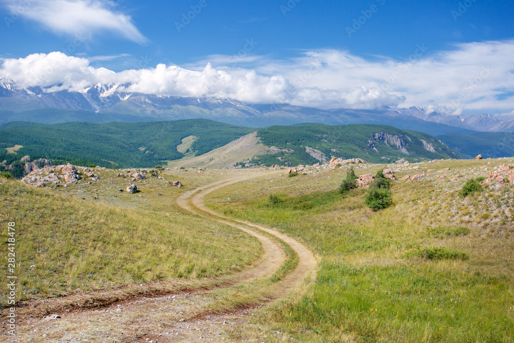 Mountain road. Country road in the mountains in summer day.