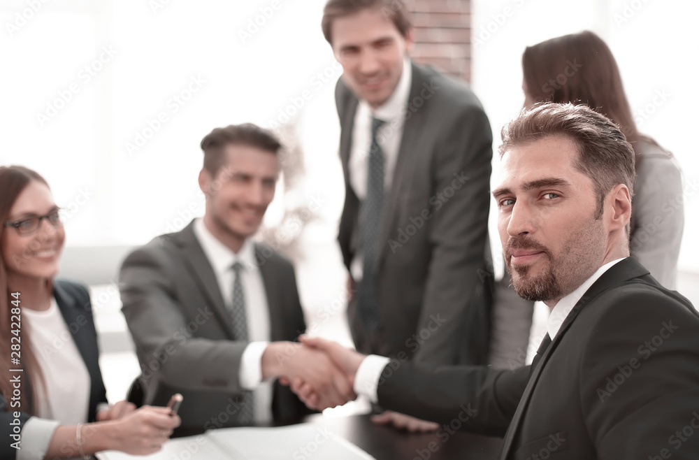 Business people doing handshake after agreement Business people doing handshake after agreement