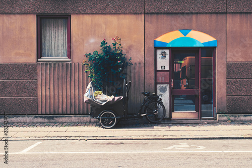 Canvas Print Bicycle with a stroller for children