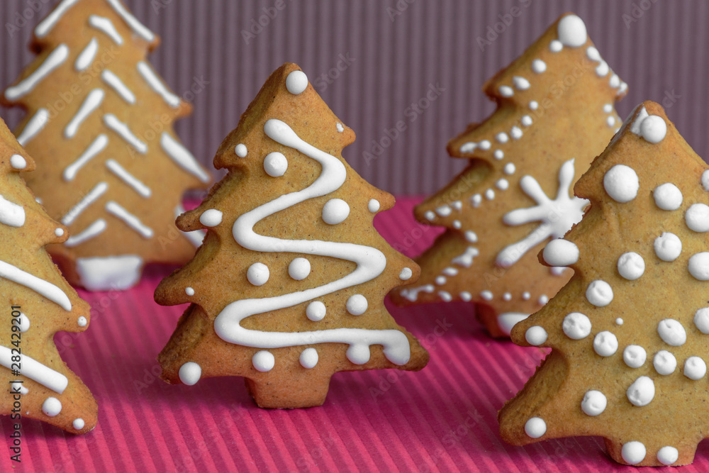 New Year's party ideas for kids. Christmas snack, cookies in shape of trees. Christmas homemade ginger cookies New Year's party ideas for kids. Christmas snack, cookies in shape of trees. Christmas homemade ginger cookies