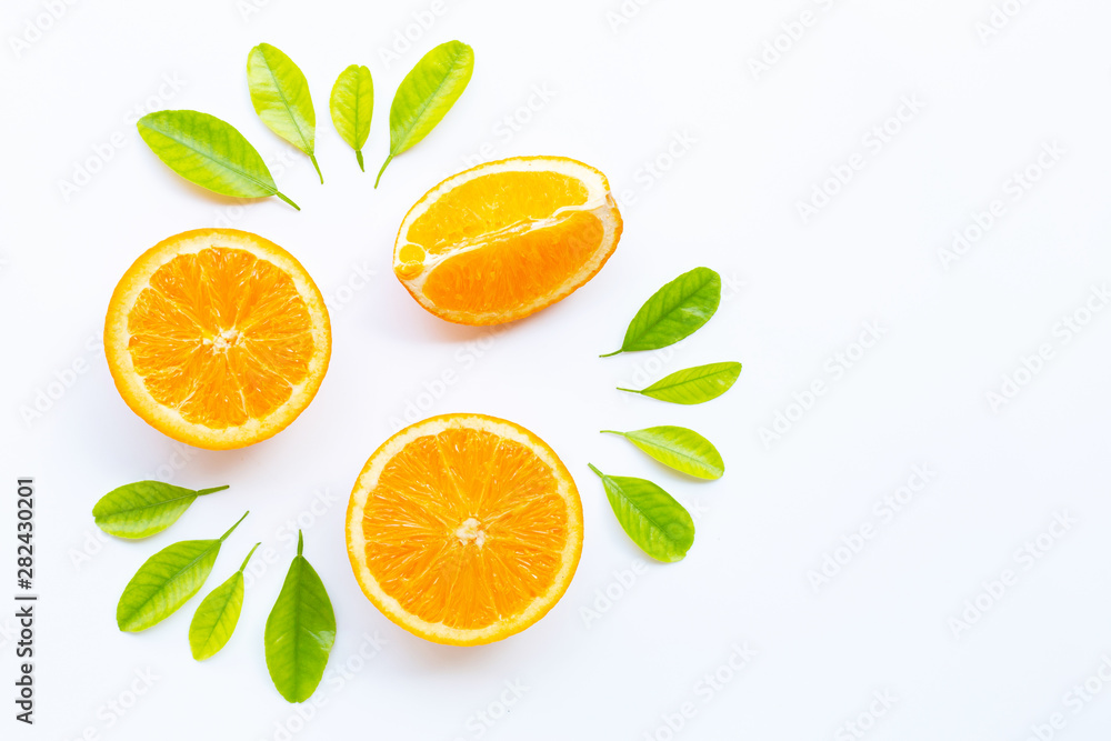 High vitamin C, Juicy and sweet. Fresh orange fruit with green leaves on white. High vitamin C, Juicy and sweet. Fresh orange fruit with green leaves on white.