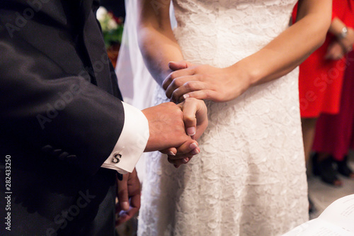 holding hands during the wedding © Brother's Art