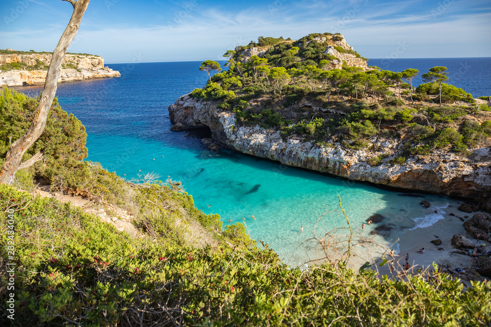 Beach in the Islas Baleares. Beautiful turquoise sea in paradise summer paradise. Tourist beach in may the island nature in the middle of the blue ocean